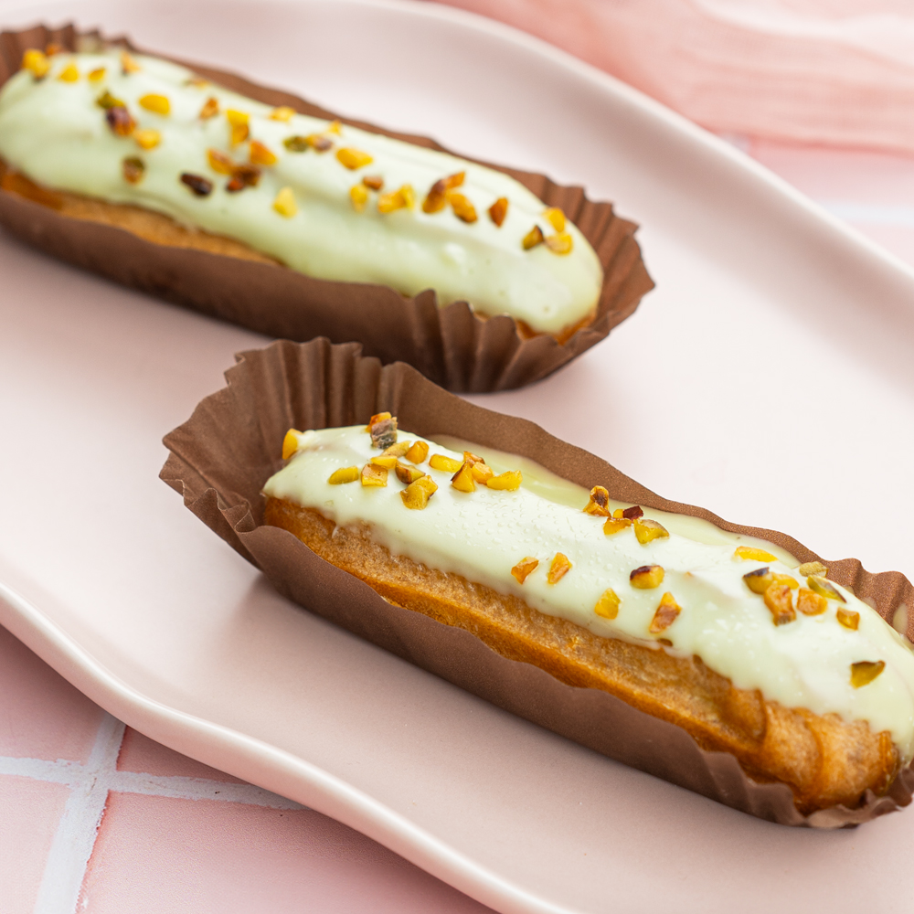 Изображение товара Пирожное Эклер ПЕКАРНЯ SPAR Фисташковый 2шт 115г